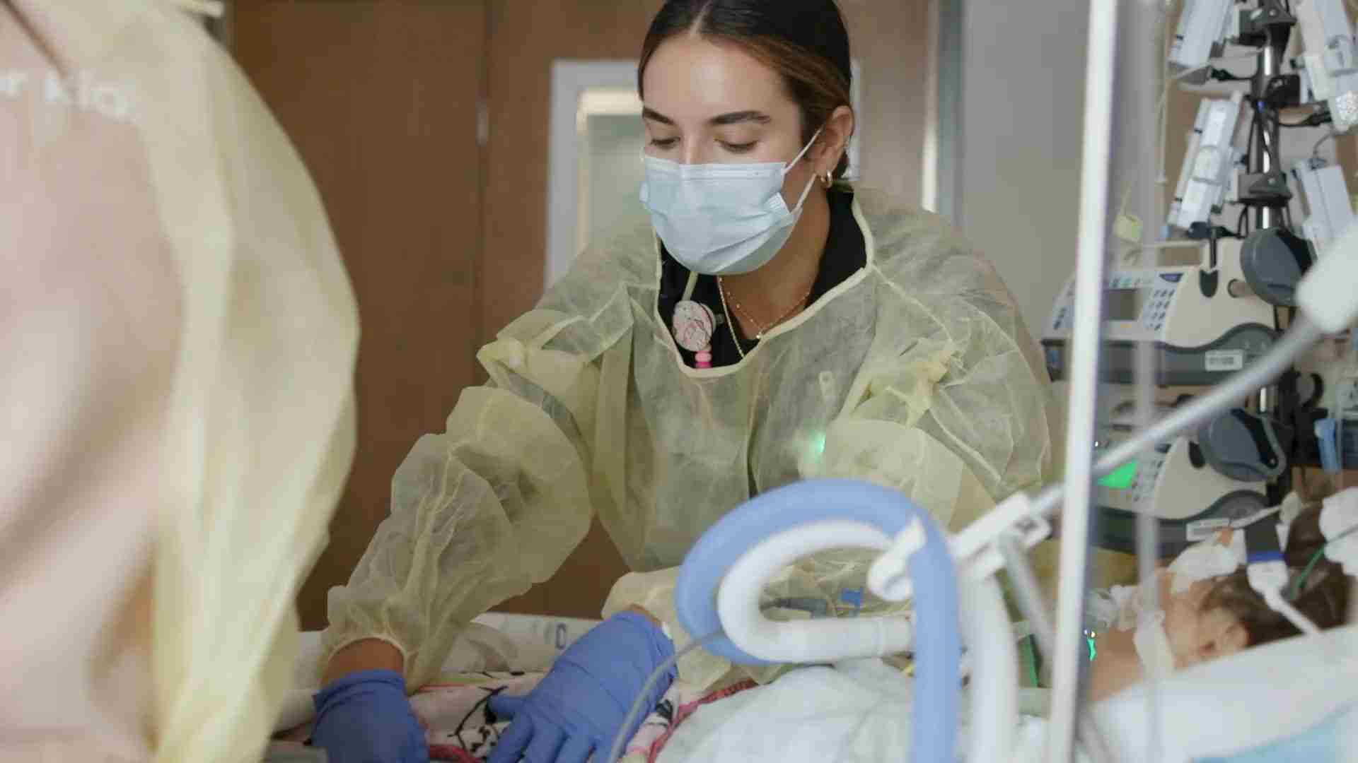 A doctor doing surgery.